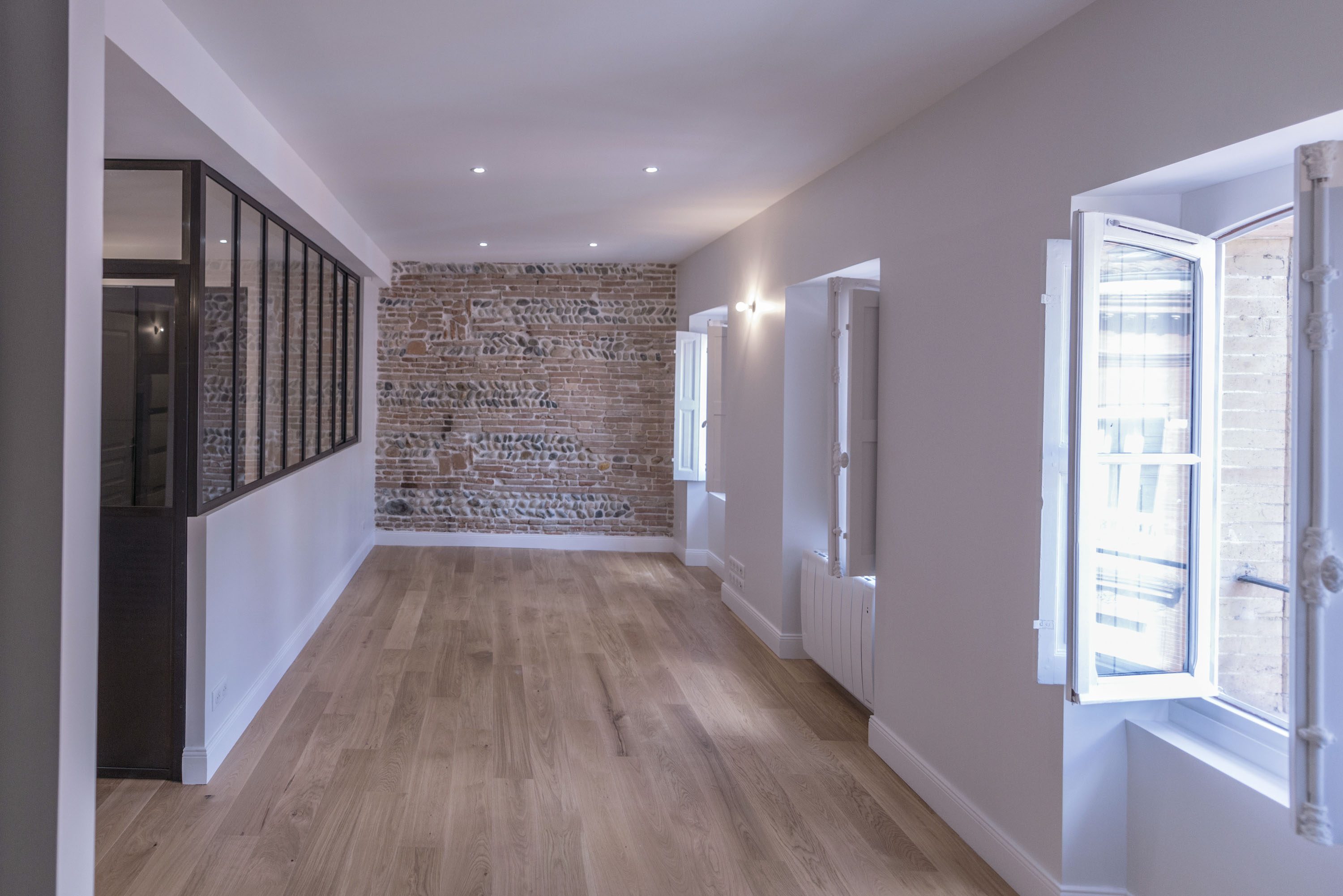 Rénovation appartement mur en pierre