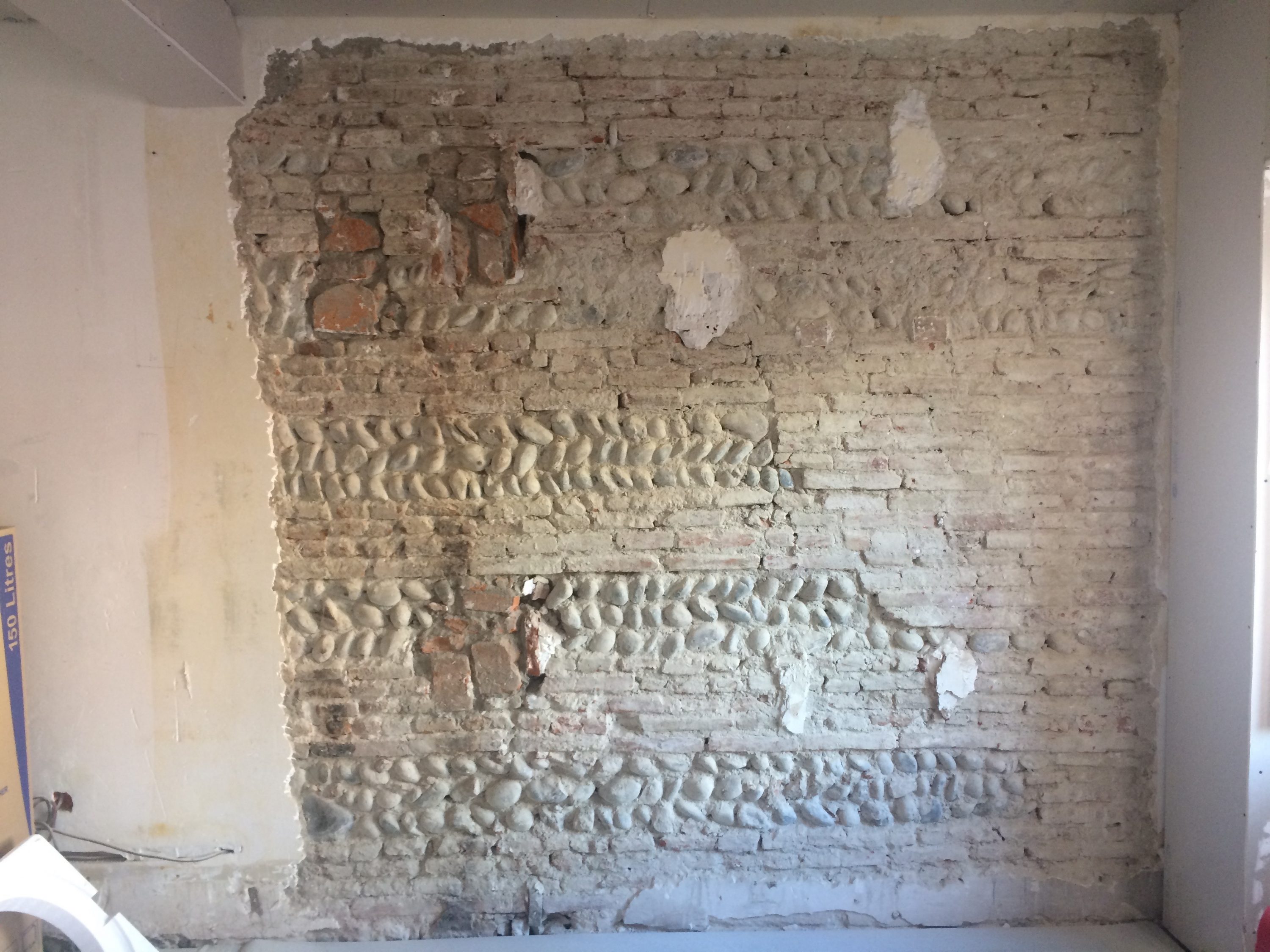 mur en briques rénovation