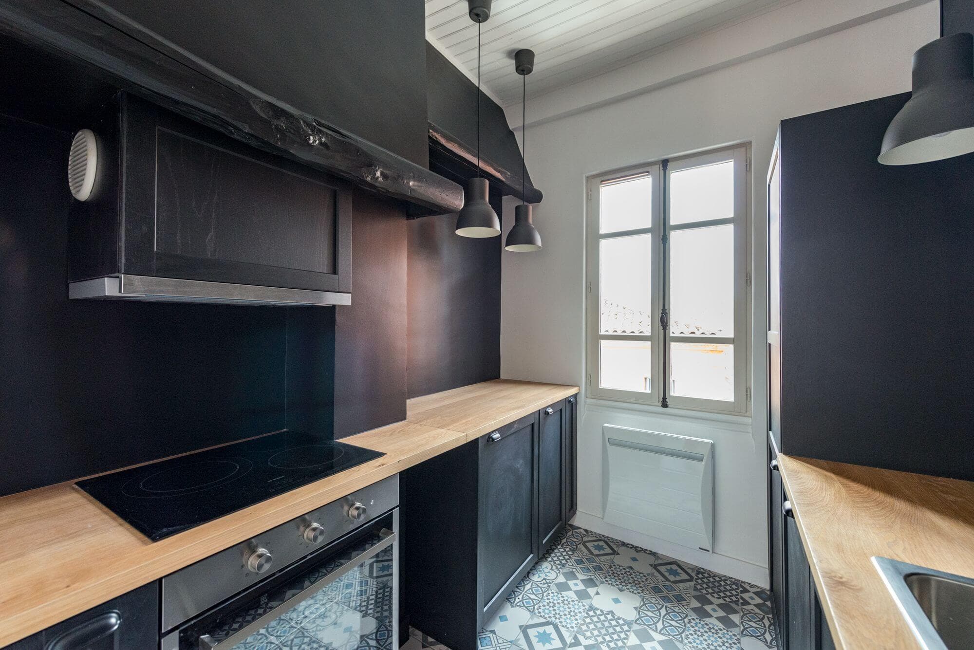 Cuisine rénovée appartement locatif Busca